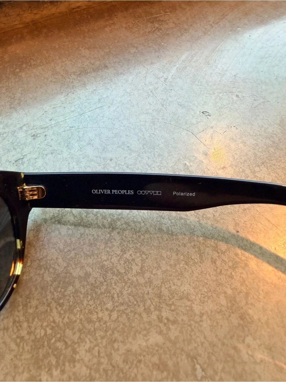 Oliver Peoples Black Cat-Eye Sunglasses with Tortoise Accents